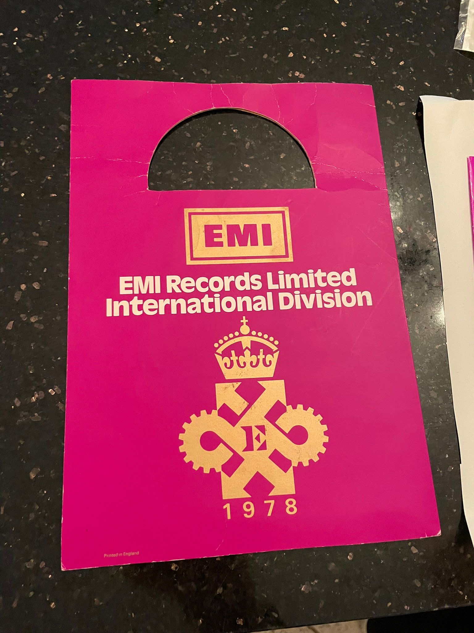 Original EMI Records Limited International Division magenta carrier bag, Queen's Award 1978